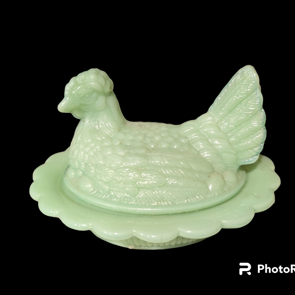 Glass hens on nest.
